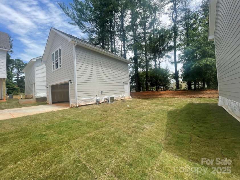 4017 Grommet Court, Matthews, NC 28105.  MLS# CAR4253909, YatesRealty ID 22516. Side Yard