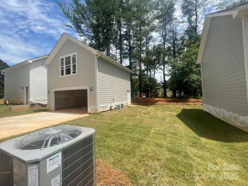 4017 Grommet Court, Matthews, NC 28105.  MLS# CAR4253909, YatesRealty ID 22516. Side Yard