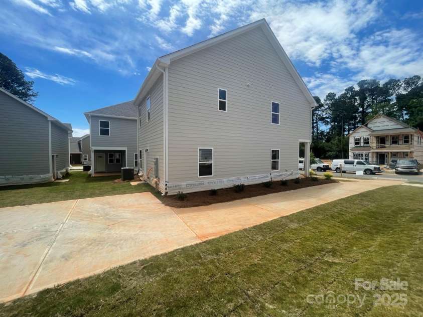 4017 Grommet Court, Matthews, NC 28105.  MLS# CAR4253909, YatesRealty ID 22516. Side Yard