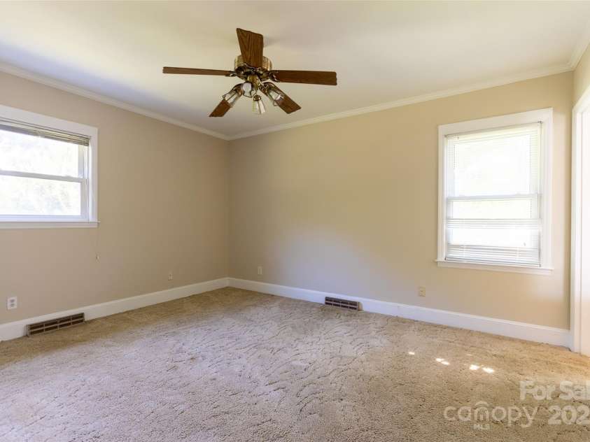 1280 Queensgate Street, Gastonia, NC 28054.  MLS# CAR4272559, YatesRealty ID 22518. Primary bedroom at back of home with private full bath