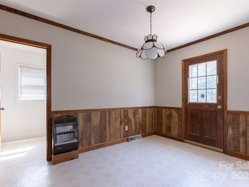 1280 Queensgate Street, Gastonia, NC 28054.  MLS# CAR4272559, YatesRealty ID 22518. Separate breakfast area - Entrance to laundry room - exit door on right to courtyard