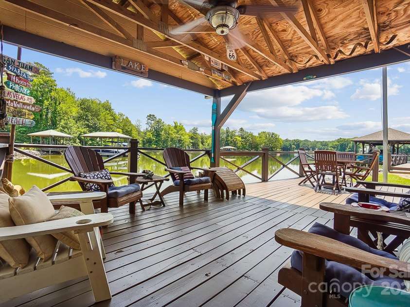 4485 River Oaks Road, Lake Wylie, SC 29710.  MLS# CAR4273028, YatesRealty ID 22521. Boathouse covered sitting area.