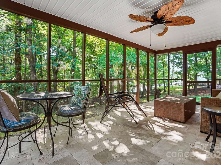 4485 River Oaks Road, Lake Wylie, SC 29710.  MLS# CAR4273028, YatesRealty ID 22521. Screened porch on the guest house.