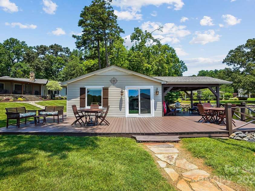 4485 River Oaks Road, Lake Wylie, SC 29710.  MLS# CAR4273028, YatesRealty ID 22521. The Boathouse has a nice deck for sunbathing and a covered sitting area.