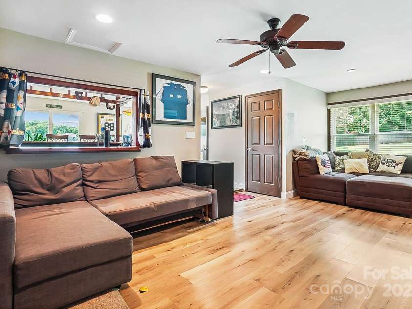 4485 River Oaks Road, Lake Wylie, SC 29710.  MLS# CAR4273028, YatesRealty ID 22521. The boathouse is set up to be a place to watch movies, a game room, or turn it into your detached office or private gym.