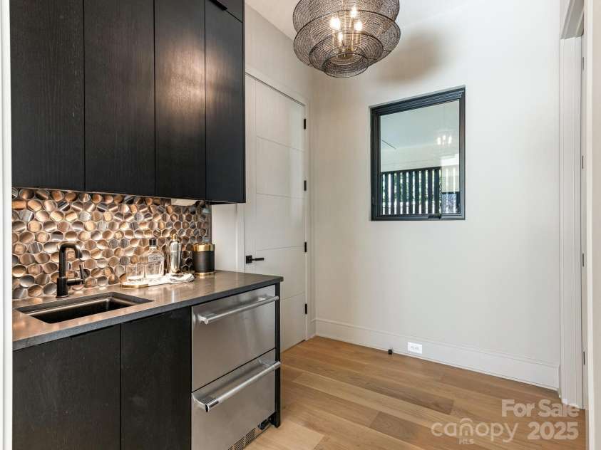 2832 Arcadia Avenue, Charlotte, NC 28209.  MLS# CAR4217335, YatesRealty ID 22525. Bar