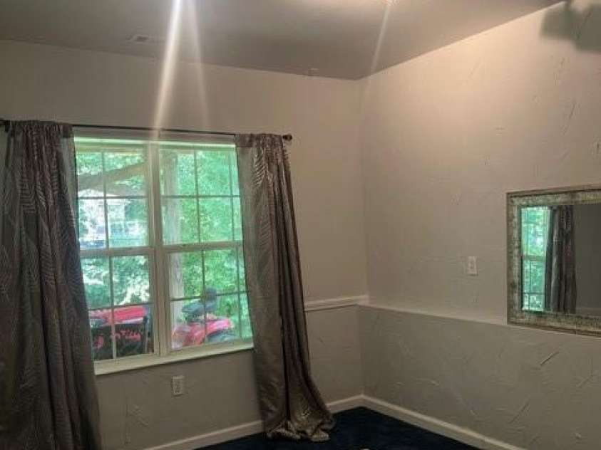 8619 Delamere Lane, Charlotte, NC 28269.  MLS# CAR4241506, YatesRealty ID 22527. Basement level bedroom