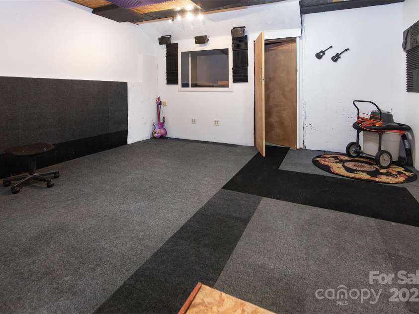 8619 Delamere Lane, Charlotte, NC 28269.  MLS# CAR4241506, YatesRealty ID 22527. Basement level storage room