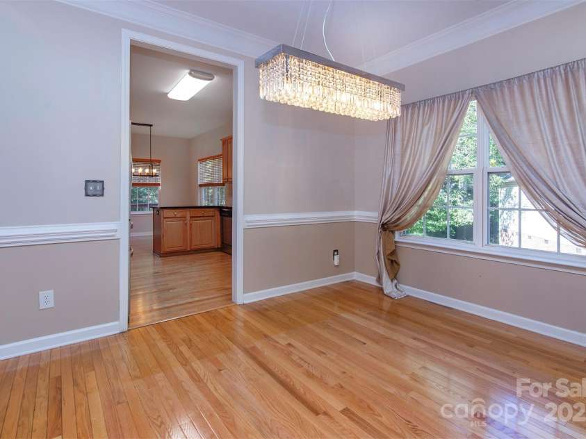 8619 Delamere Lane, Charlotte, NC 28269.  MLS# CAR4241506, YatesRealty ID 22527. Dining area without furniture