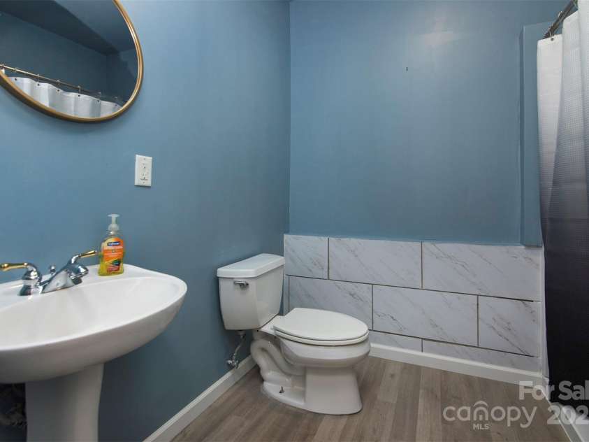 8619 Delamere Lane, Charlotte, NC 28269.  MLS# CAR4241506, YatesRealty ID 22527. Full bath on basement level