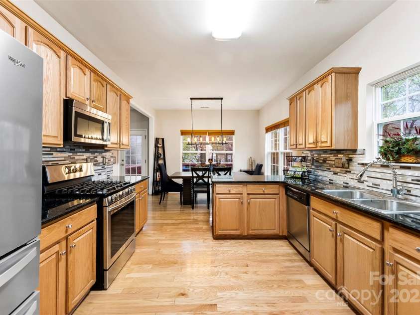 8619 Delamere Lane, Charlotte, NC 28269.  MLS# CAR4241506, YatesRealty ID 22527. Kitchen furnished