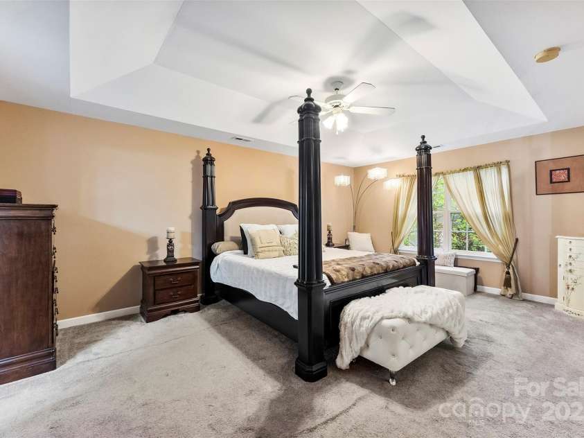 8619 Delamere Lane, Charlotte, NC 28269.  MLS# CAR4241506, YatesRealty ID 22527. Primary bedroom furnished