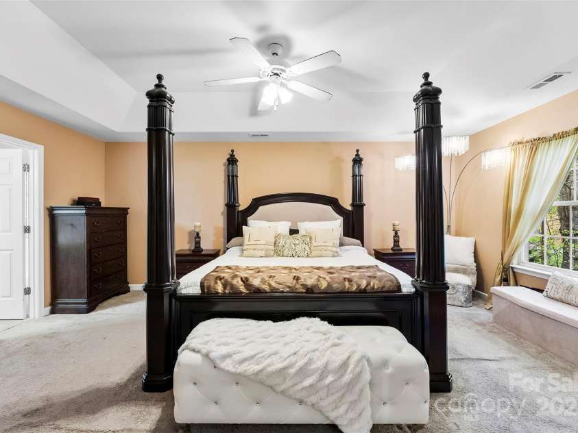 8619 Delamere Lane, Charlotte, NC 28269.  MLS# CAR4241506, YatesRealty ID 22527. Primary bedroom furnished
