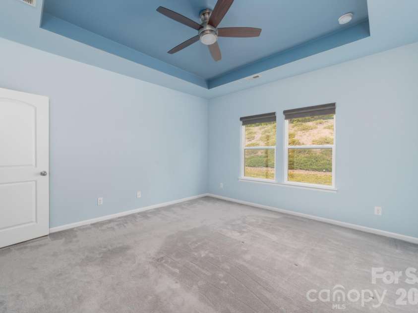 202 Paradise Hills Circle, Mooresville, NC 28115.  MLS# CAR4329082, YatesRealty ID 22528. A masterclass in calm, this suite blends elevated finishes with an effortless, restful vibe.