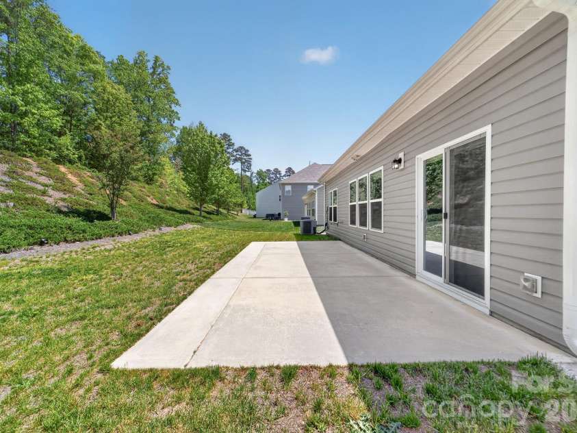 202 Paradise Hills Circle, Mooresville, NC 28115.  MLS# CAR4329082, YatesRealty ID 22528. Enjoy outdoor living with a convenient direct gas connection on the back porch, making grilling easy, efficient, and always ready—no tank refills required.