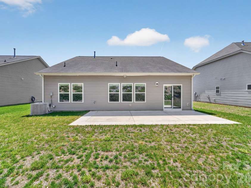 202 Paradise Hills Circle, Mooresville, NC 28115.  MLS# CAR4329082, YatesRealty ID 22528. Enjoy outdoor living with a convenient direct gas connection on the back porch, making grilling easy, efficient, and always ready—no tank refills required.