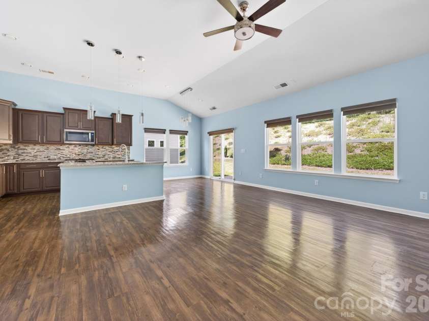 202 Paradise Hills Circle, Mooresville, NC 28115.  MLS# CAR4329082, YatesRealty ID 22528. Immaculately maintained and showing like a model home, this residence offers the pristine feel of new construction with the added value of custom upgrades throughout.