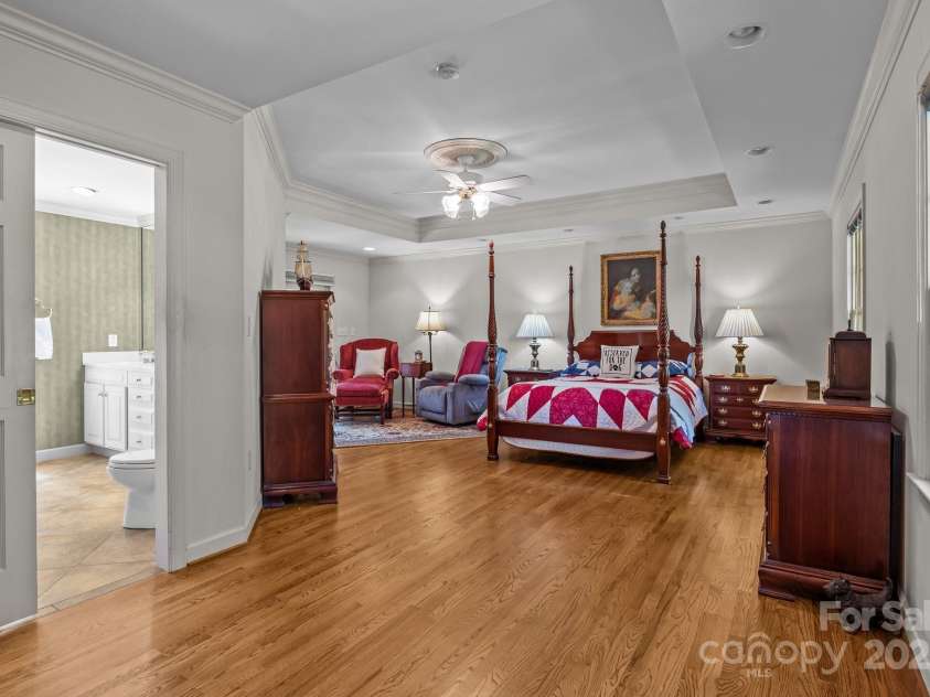 3209 Sedgefield Road, Statesville, NC 28625.  MLS# CAR4259926, YatesRealty ID 22531. 1st floor primary suite. On the left is the pocket door to the bath ensuite.