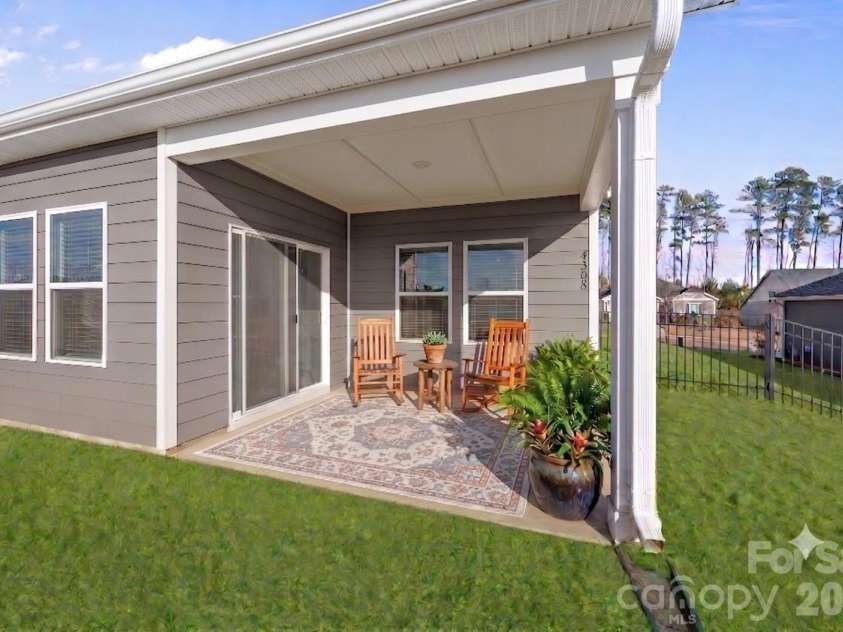 4308 Duplin Drive, Charlotte, NC 28214.  MLS# CAR4397845, YatesRealty ID 22531. Back Patio - virtually staged