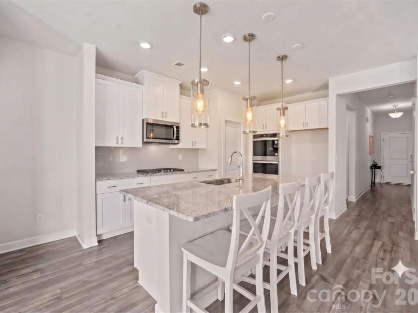 4308 Duplin Drive, Charlotte, NC 28214.  MLS# CAR4397845, YatesRealty ID 22531. Kitchen island - virtually staged
