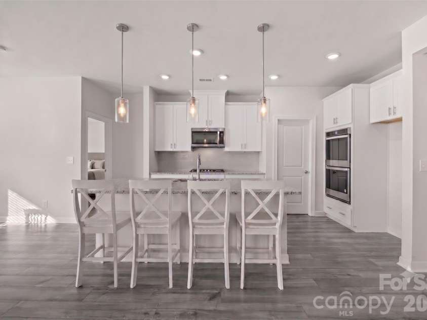 4308 Duplin Drive, Charlotte, NC 28214.  MLS# CAR4397845, YatesRealty ID 22531. Kitchen - virtually staged lighting