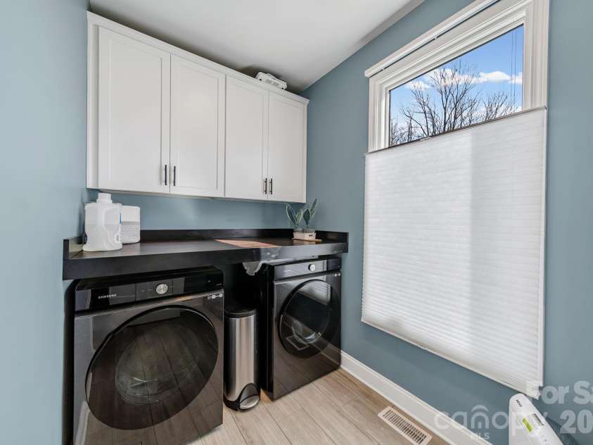 128 Laurel Ridge Drive, Statesville, NC 28677.  MLS# CAR4346436, YatesRealty ID 22532. Laundry room