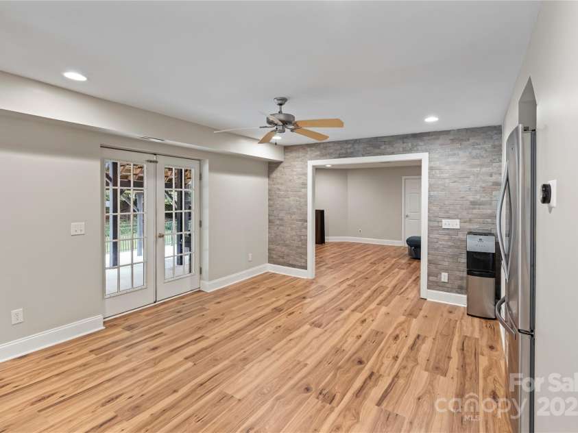 2006 Sandy Pond Lane, Waxhaw, NC 28173.  MLS# CAR4261371, YatesRealty ID 22532. Large open space, leading to seamless indoor/outdoor living and media room