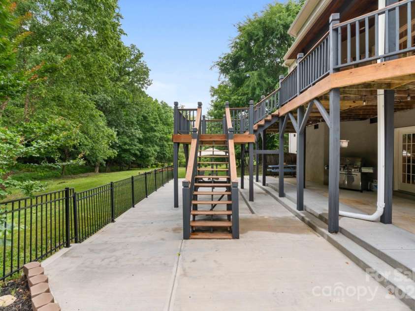 2006 Sandy Pond Lane, Waxhaw, NC 28173.  MLS# CAR4261371, YatesRealty ID 22532. Multiple levels and areas for entertainment