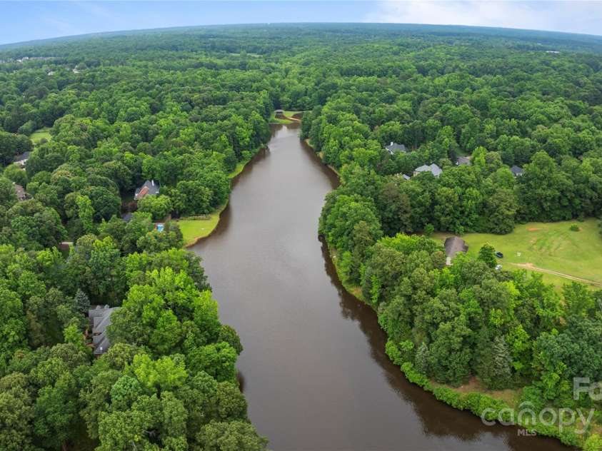 2006 Sandy Pond Lane, Waxhaw, NC 28173.  MLS# CAR4261371, YatesRealty ID 22532. One of two large ponds in the neighborhood
