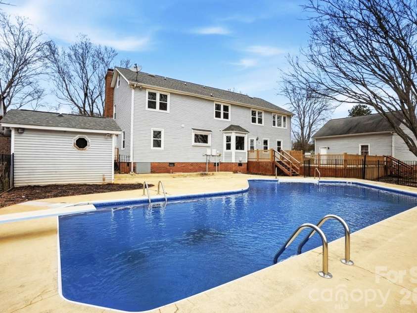 5632 Zion Church Road, Concord, NC 28025.  MLS# CAR4351417, YatesRealty ID 22534. Stunning In-ground Pool