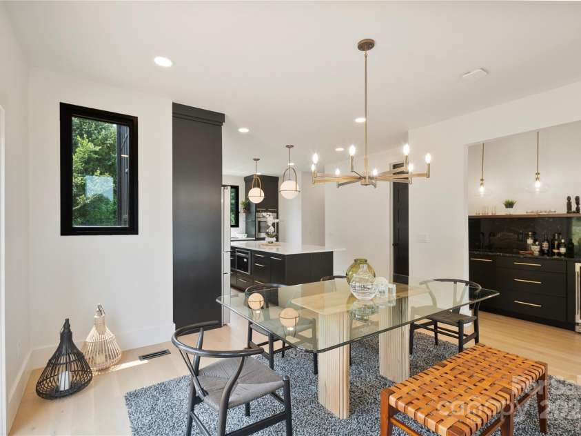 309 Sain Road, Statesville, NC 28625.  MLS# CAR4265333, YatesRealty ID 22536. Dining Room with adjoining Wet Bar