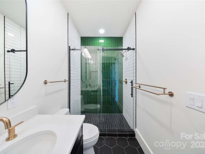 309 Sain Road, Statesville, NC 28625.  MLS# CAR4265333, YatesRealty ID 22536. Sliding glass shower doors & marble shower floor