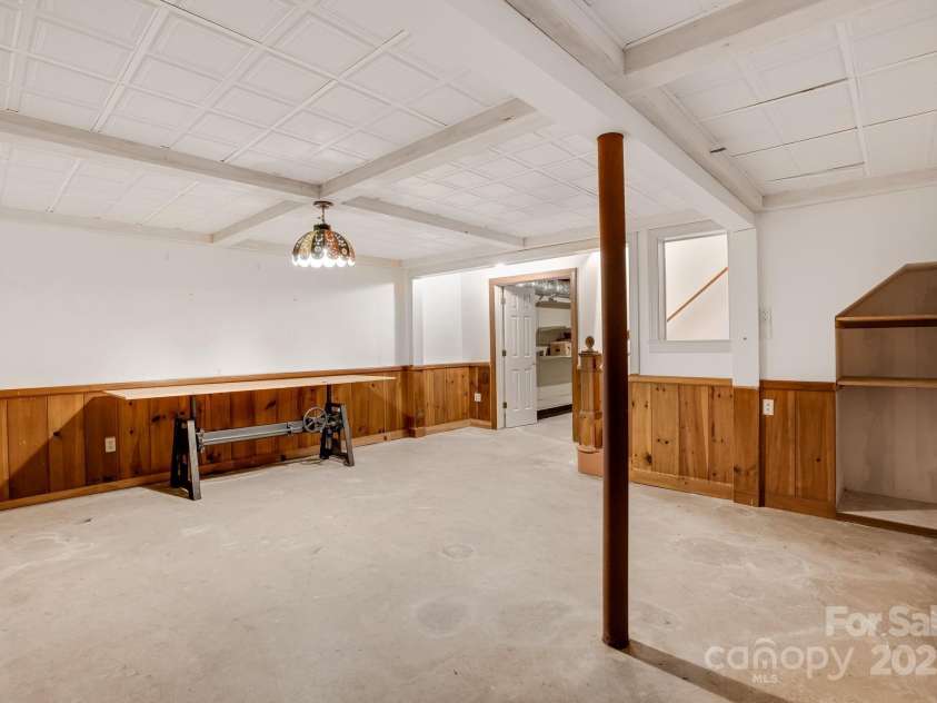2 Honey Drive, Asheville, NC 28805.  MLS# CAR4268157, YatesRealty ID 22537. Basement / office