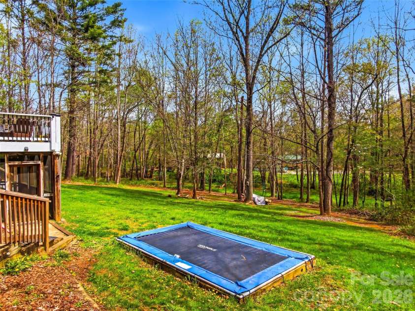 32 Franklin Farm Road, Fletcher, NC 28732.  MLS# CAR4366172, YatesRealty ID 22538. In ground trampoline.
