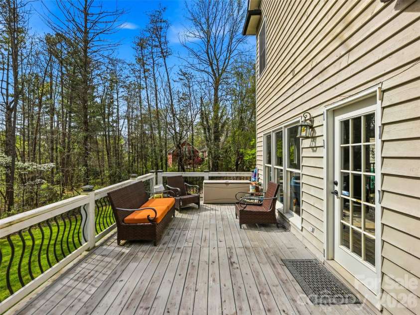 32 Franklin Farm Road, Fletcher, NC 28732.  MLS# CAR4366172, YatesRealty ID 22538. Large main level back deck.