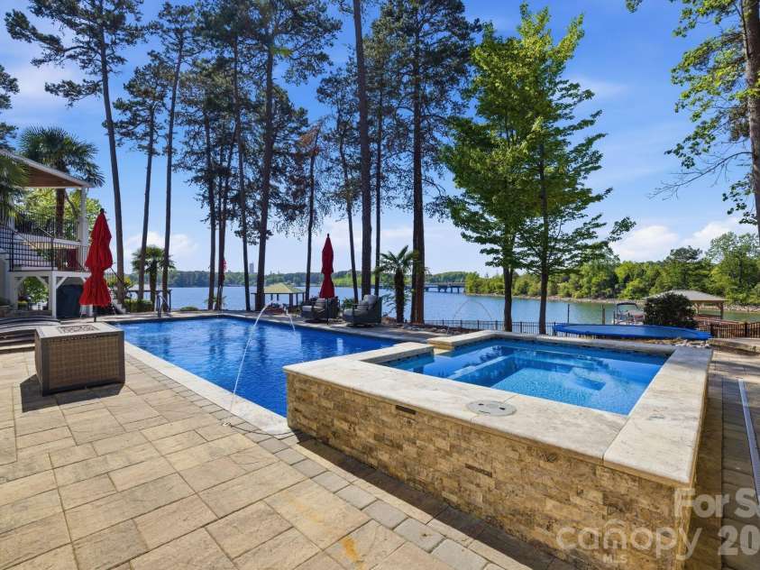 144 Mariner Pointe Lane, Mooresville, NC 28117.  MLS# CAR4336231, YatesRealty ID 22545. Backyard pool.