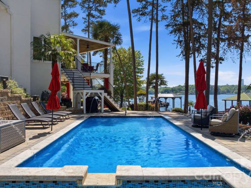 144 Mariner Pointe Lane, Mooresville, NC 28117.  MLS# CAR4336231, YatesRealty ID 22545. Backyard pool.