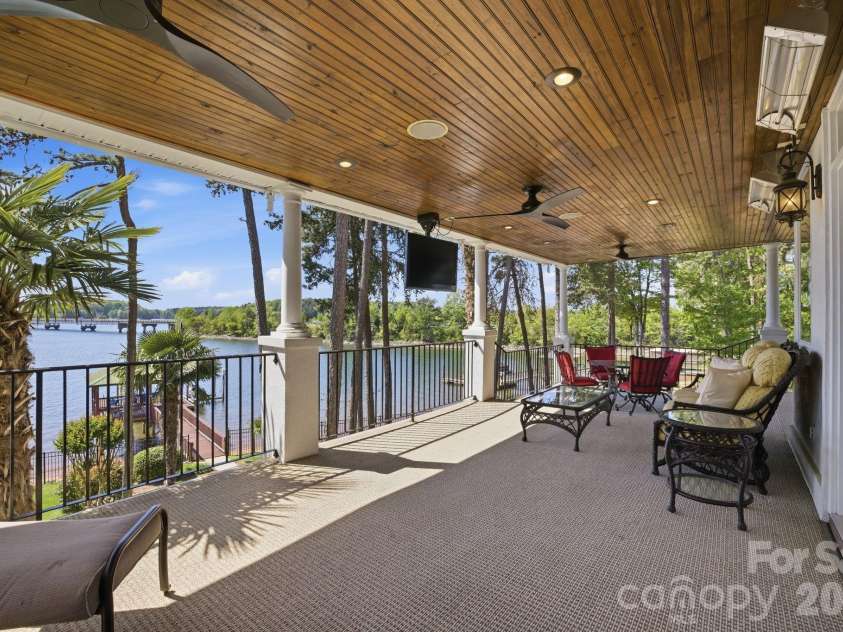 144 Mariner Pointe Lane, Mooresville, NC 28117.  MLS# CAR4336231, YatesRealty ID 22545. Main level covered patio.