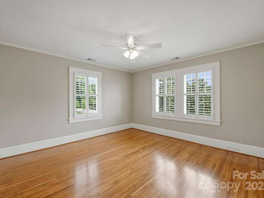 215 Main Street, Belmont, NC 28012.  MLS# CAR4134774, YatesRealty ID 22545. One of four generous size bedrooms located on the second floor with beautiful hardwood floors and great light.