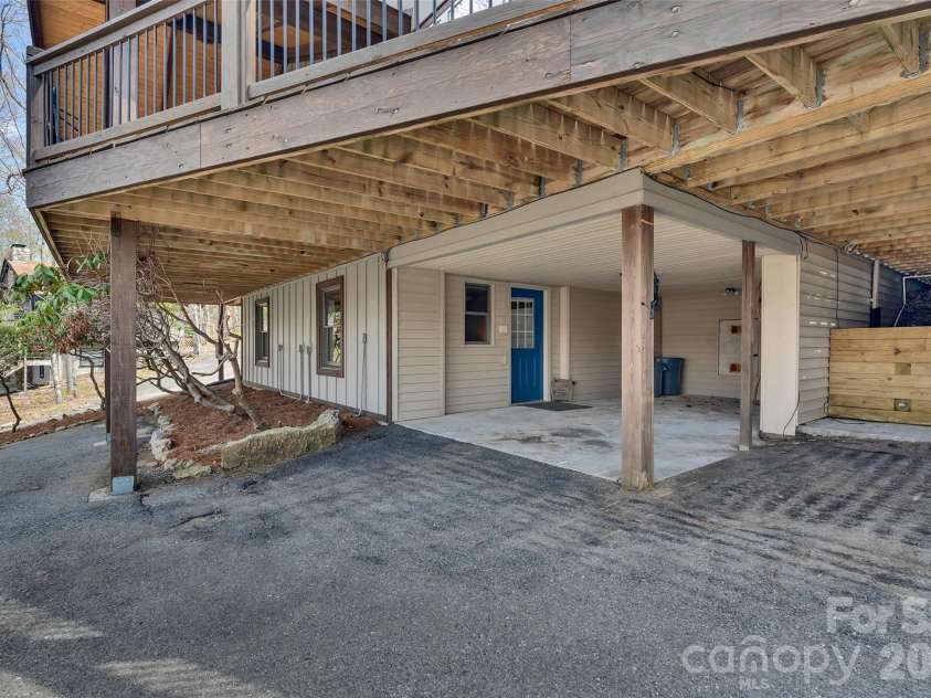 202 Tamarack Road, Beech Mountain, NC 28604.  MLS# CAR4371632, YatesRealty ID 22550. Lower covered parking