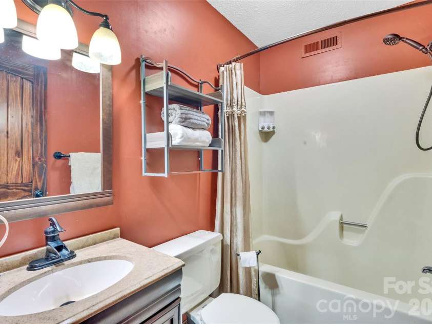202 Tamarack Road, Beech Mountain, NC 28604.  MLS# CAR4371632, YatesRealty ID 22550. Lower Lvl Bathroom