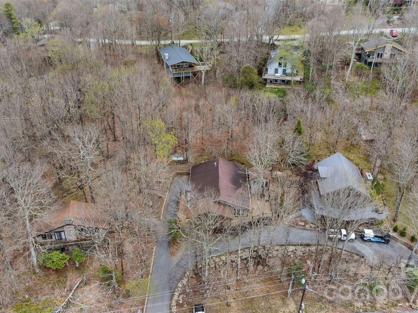 202 Tamarack Road, Beech Mountain, NC 28604.  MLS# CAR4371632, YatesRealty ID 22550. Lower pad for extra parking