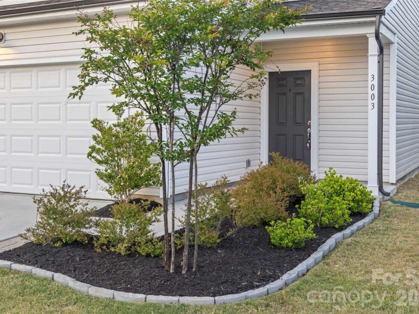 3003 Langhorne Avenue, Concord, NC 28027.  MLS# CAR4376854, YatesRealty ID 22551. Covered front porch