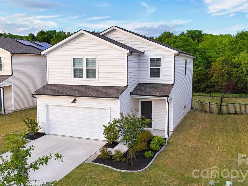 3003 Langhorne Avenue, Concord, NC 28027.  MLS# CAR4376854, YatesRealty ID 22551. Front exterior view toward backyard