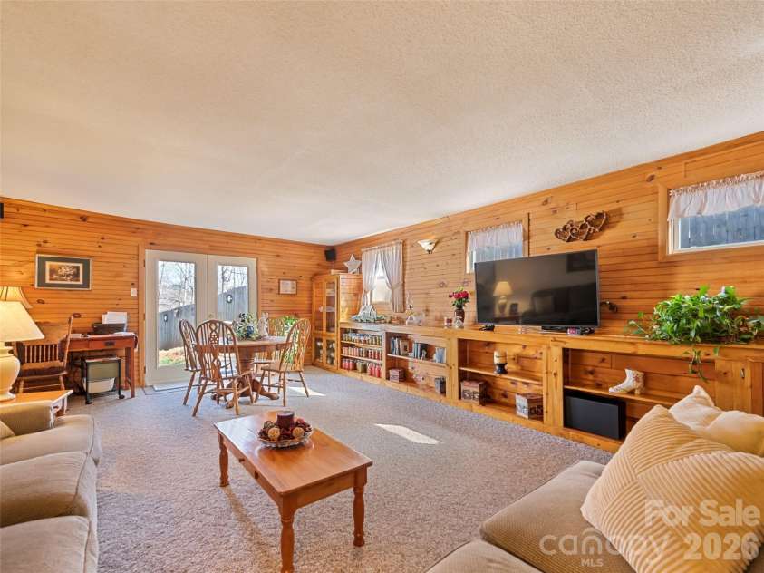 136 Peaceful Valley Drive, Leicester, NC 28748.  MLS# CAR4378331, YatesRealty ID 22556. Exit to fenced back yard