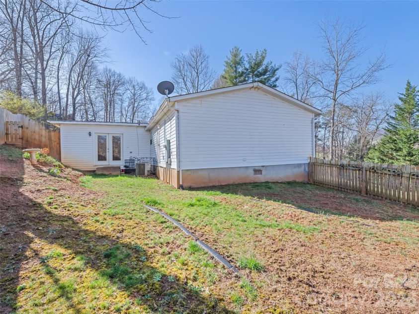 136 Peaceful Valley Drive, Leicester, NC 28748.  MLS# CAR4378331, YatesRealty ID 22556. Fenced in back yard