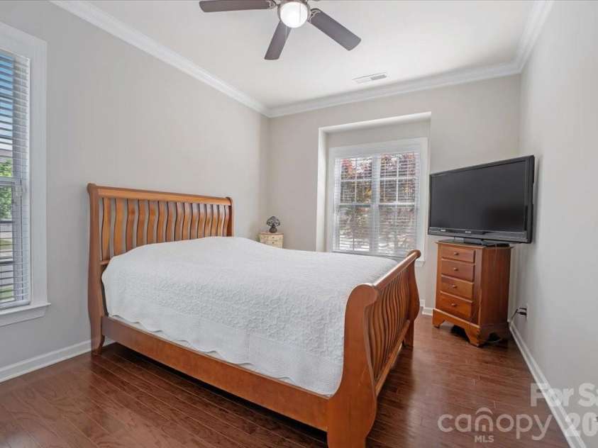 13335 Union Square Drive, Huntersville, NC 28078.  MLS# CAR4379462, YatesRealty ID 22558. Front bedroom #2 with ensuite bathroom with newly updated walk-in shower