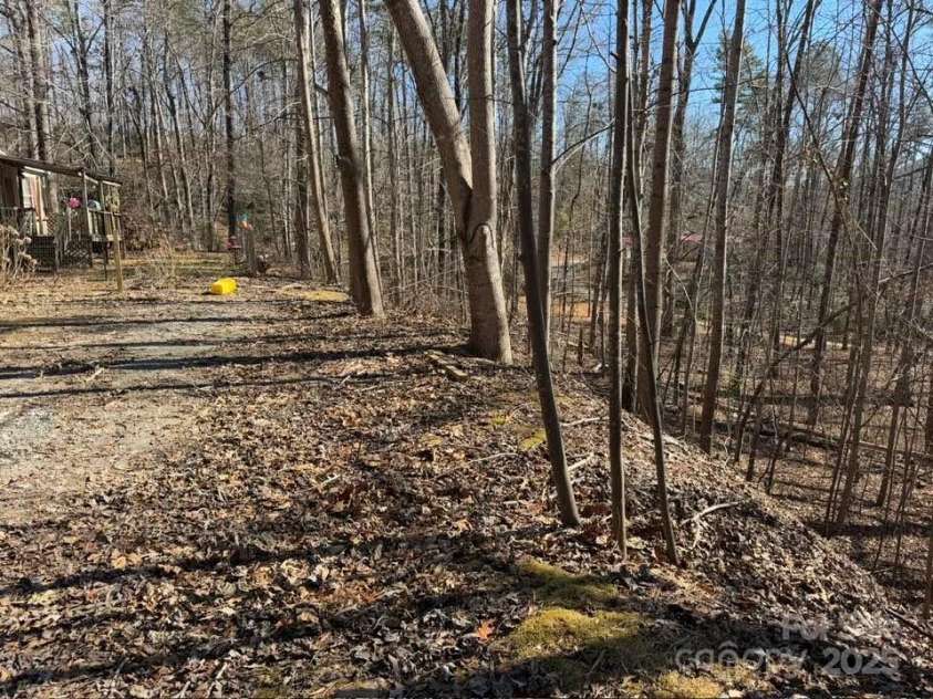 127 Round Top Road, Mill Spring, NC 28756.  MLS# CAR4217273, YatesRealty ID 2256. 