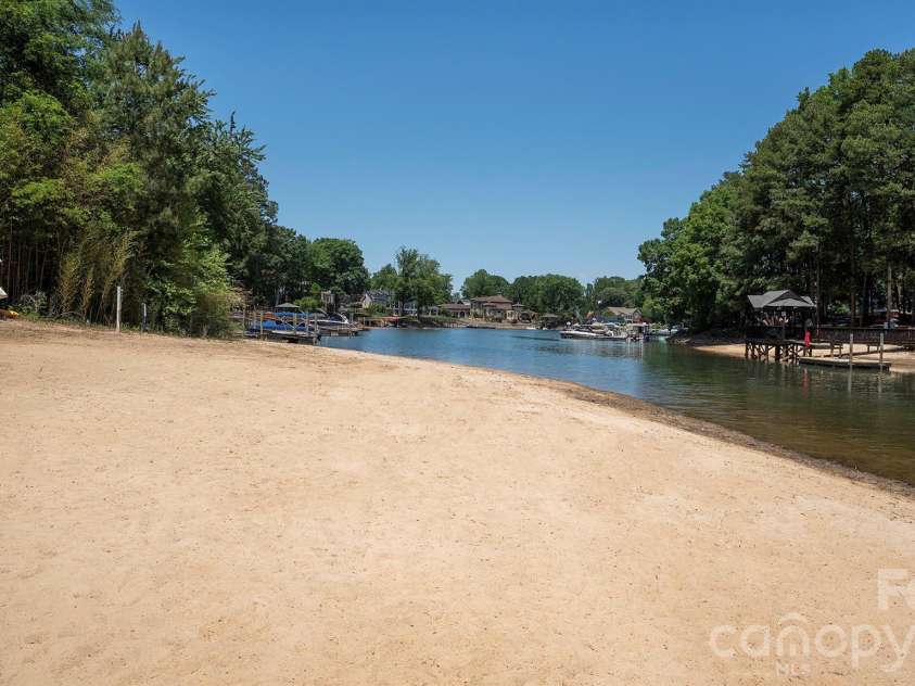 19823 Henderson Road, Cornelius, NC 28031.  MLS# CAR4374380, YatesRealty ID 22560. Private beach...
