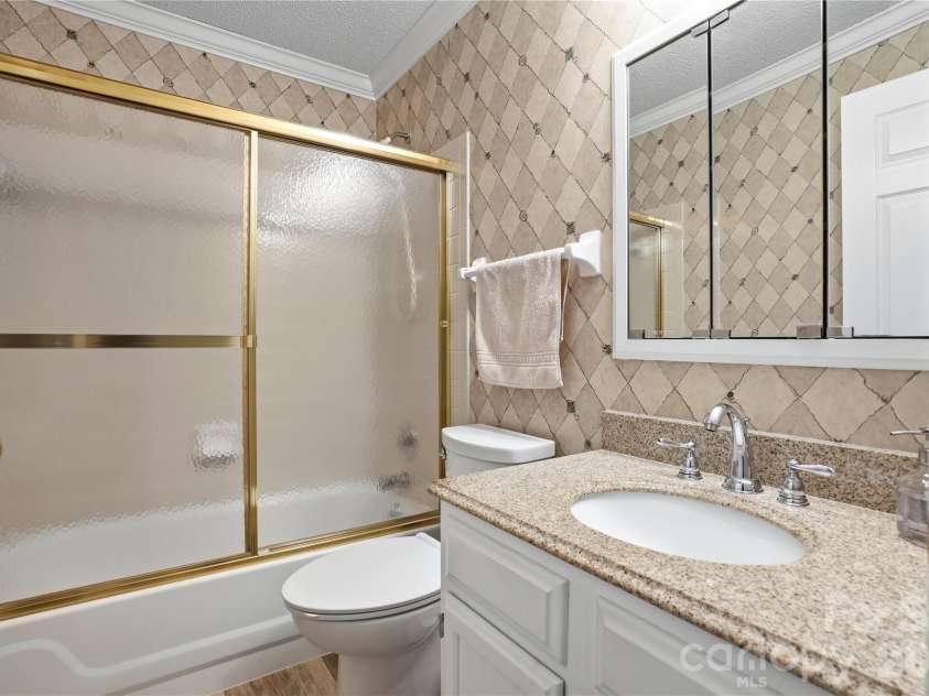 19823 Henderson Road, Cornelius, NC 28031.  MLS# CAR4377209, YatesRealty ID 22560. Another view of secondary bath